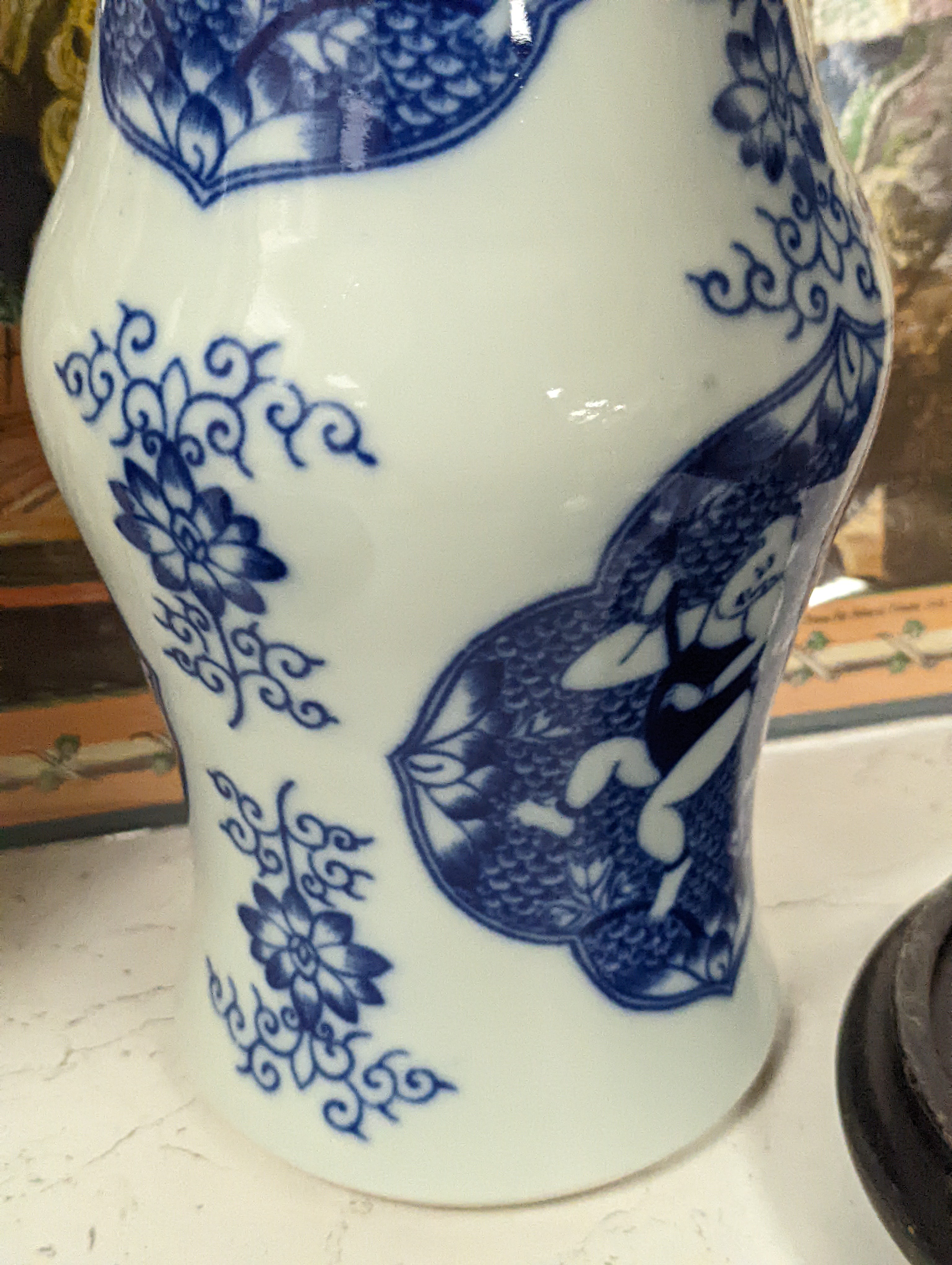 A pair of Chinese blue and white vases on stands and 6 further wood stands. Vases 35cm